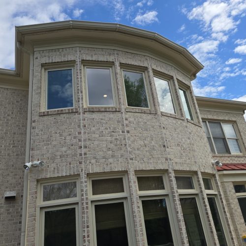 5-panel-bow-windows-curved-brick-exterior panel windows with curved brick exterior