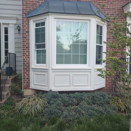 classic-white-bay-window-brick-townhouse Casement Window Replacement in Fairfax, VA